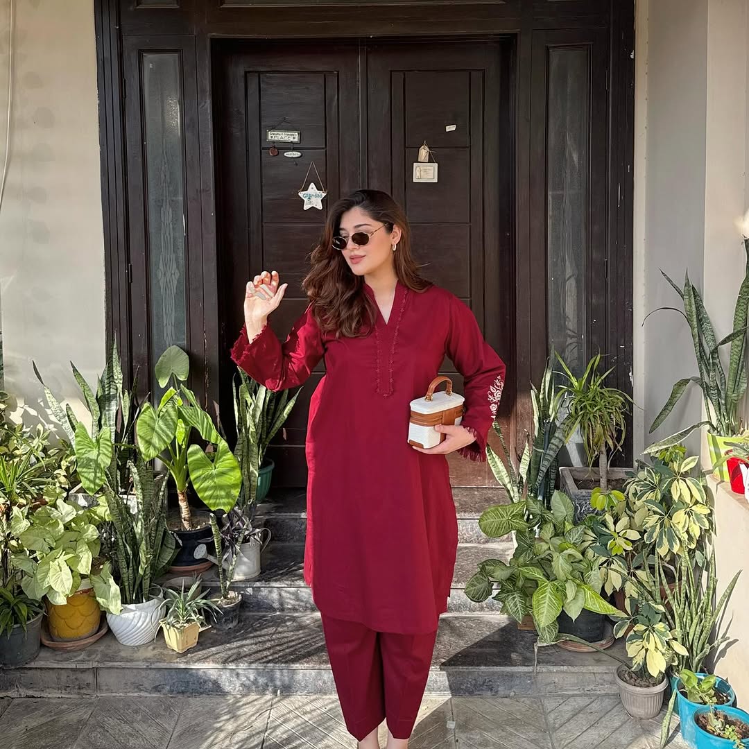 two piece  embroidery and details on the sleeves, paired with straight Pants