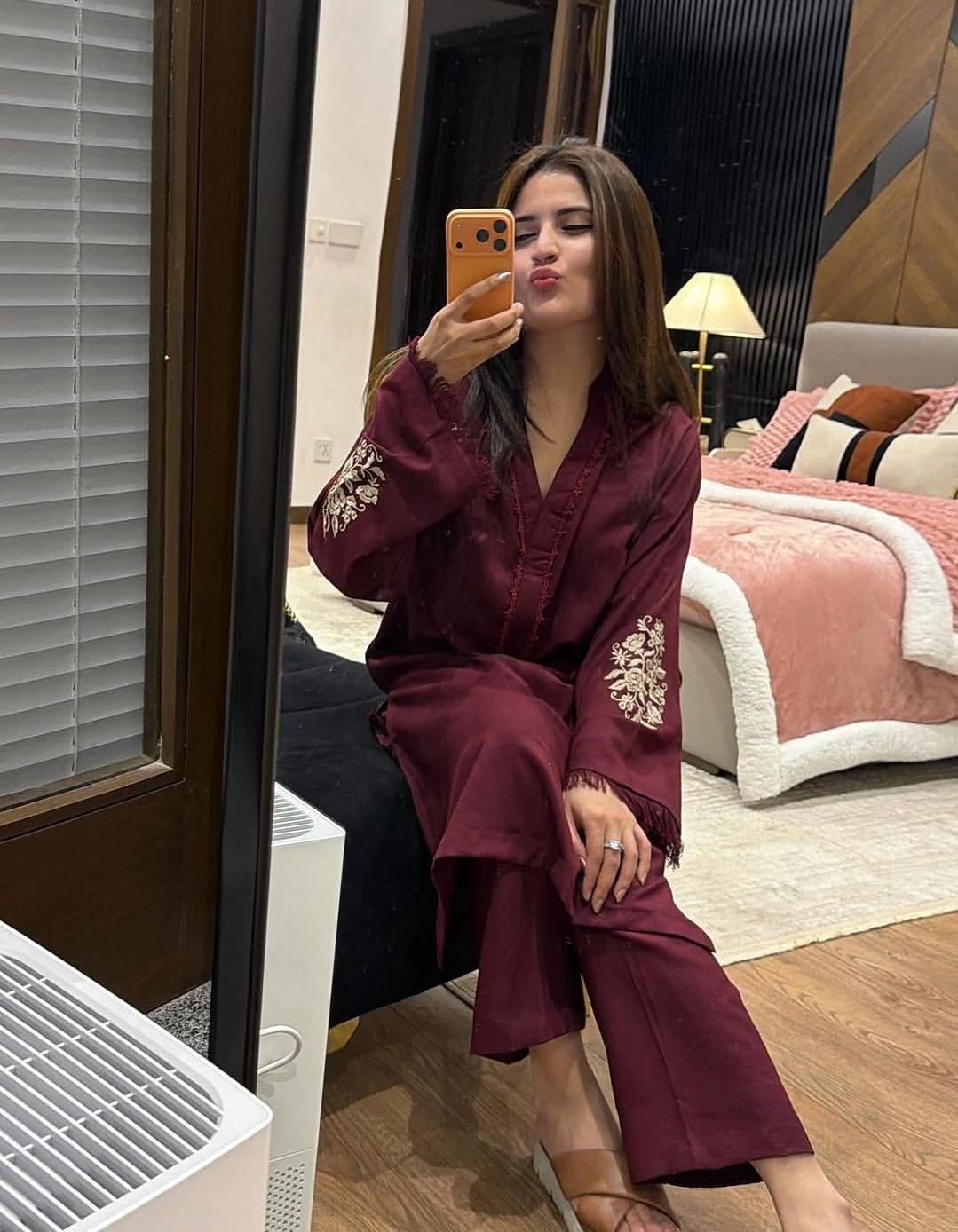 two piece  embroidery and details on the sleeves, paired with straight Pants