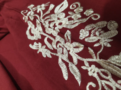 two piece  embroidery and details on the sleeves, paired with straight Pants